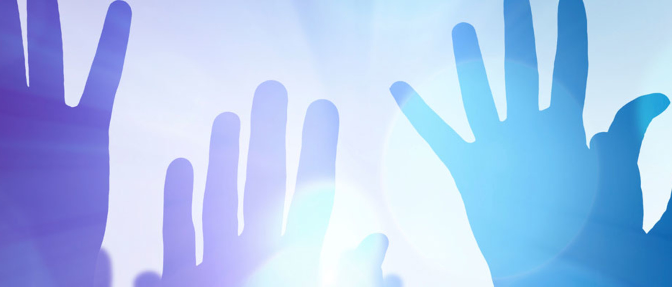 Abstract photo of hands in bright light